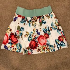 High rise floral mini skirt